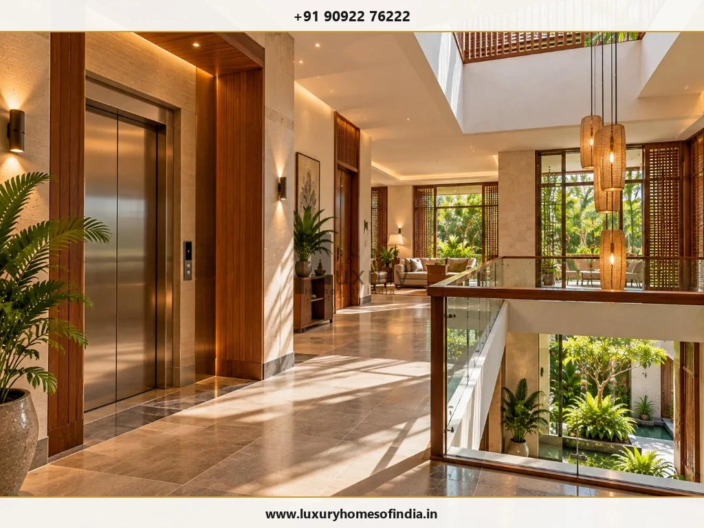 Heritage-contemporary Pondicherry villa with refined elevator doors and natural stone landing